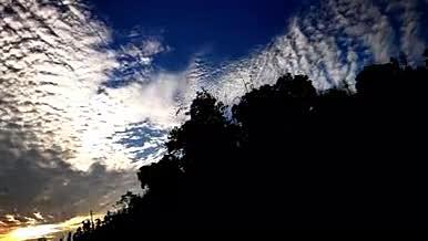 蓝天白云夕阳延时空境视频的预览图